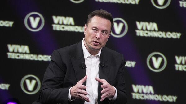 Musk swears at firms ‘trying to blackmail with money’ and says ‘don’t advertise’