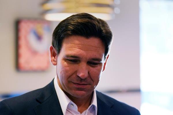 Republican presidential candidate, Florida Gov. Ron DeSantis, listens to a question from a guest during a campaign stop at a diner, Tuesday, Oct. 24, 2023, in Londonderry, New Hampshire.