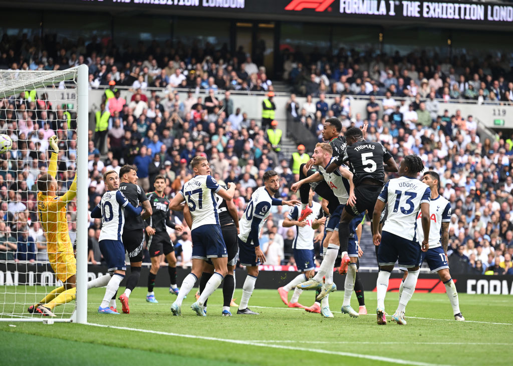 Gabriel heads past Tottenham goalkeeper Guglielmo Vicario to score the Arsenal goal during the Premier League match between Tottenham Hotspur FC and Arsenal