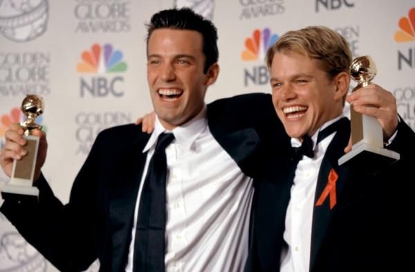 Ben Affleck and Matt Damon hold their Golden Globes in the press room during the 55th Annual Golden Globe Awards on January 18, 1998.