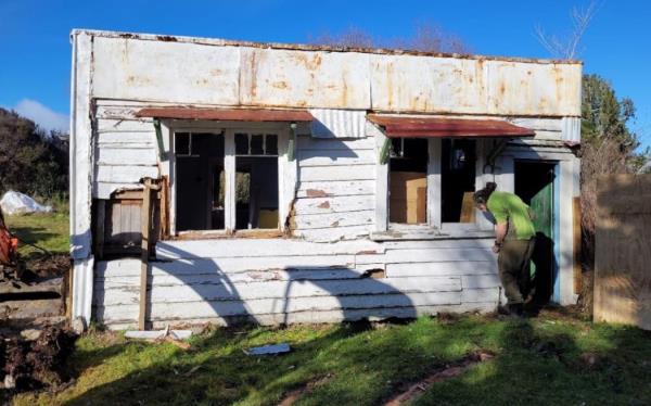 The Jos Divis cottage as it appeared when DOC began its work, in July 2022.