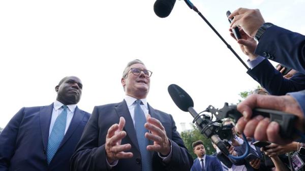 Sir Keir Starmer and David Lammy speaking to the media outside the White House. Pic: PA