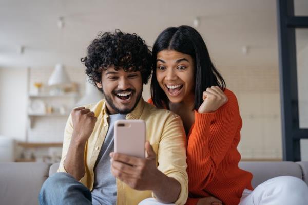 couple excited winning the lottery