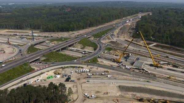 Concrete beams for a bridge at Junction 10 being installed in May. Pic: PA