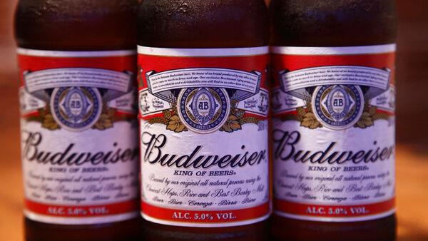 AB InBev's shares slip on stake sale by tobacco giant