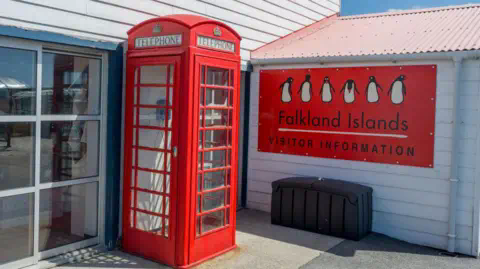 Getty Images A classic British red phone box is pictured outside the Falkland Islands visitors centre in Port Stanley.