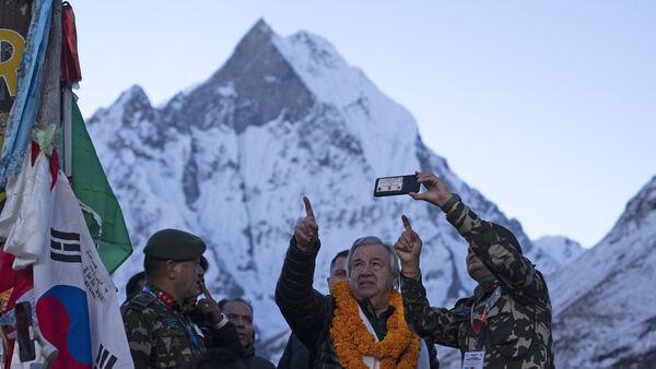 World must end fossil fuel age, says Guterres after visiting melting glaciers