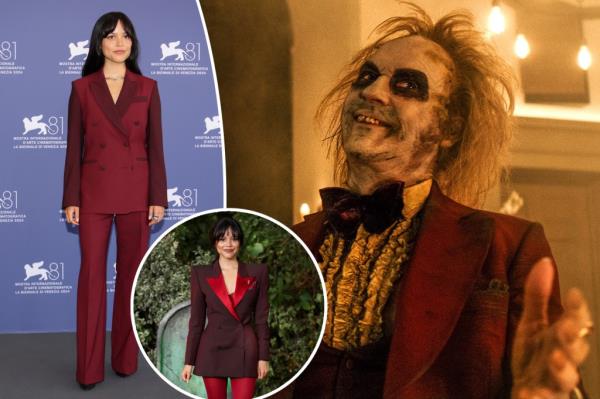 Ortega wore a custom burgundy Paul Smith suit in Venice and a burgundy blazer dress with co<em></em>ntrasting red lapels from Alexander McQueen and pillar box red rights in London.
