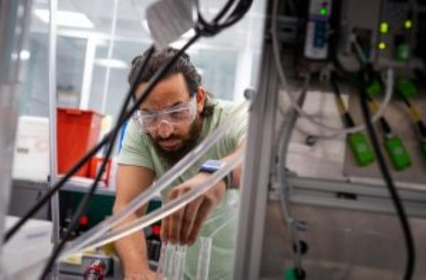 Usama Sheikh in a laboratory.