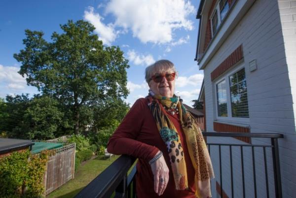 Gill Ross and her apartment in Bagshot, Surrey are the subject of a What I Own feature. This picture shows Gill Ross on her balcony overlooking the private gardens. 