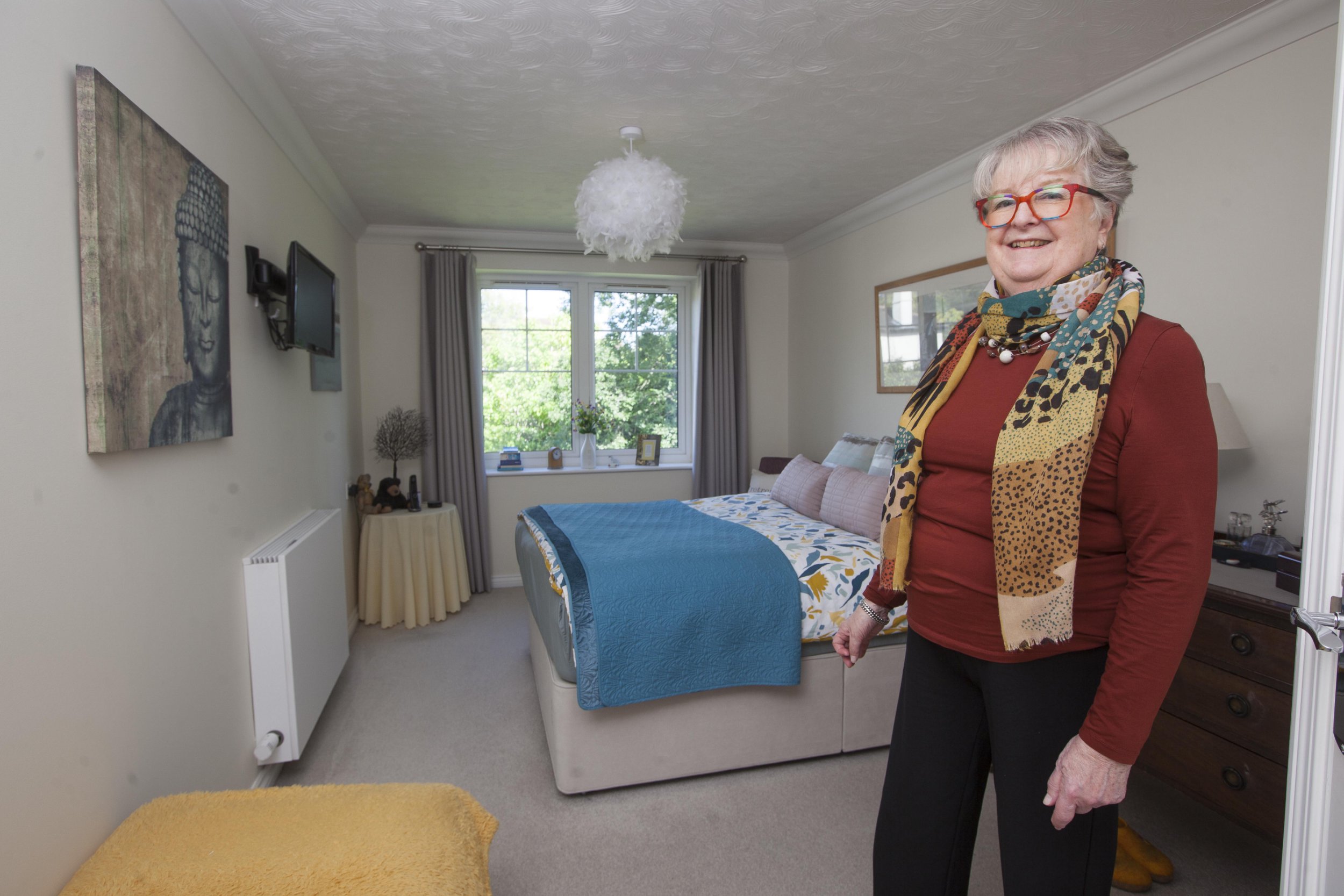 Gill Ross and her apartment in Bagshot, Surrey are the subject of a What I Own feature. This picture shows Gill Ross in the bedroom.