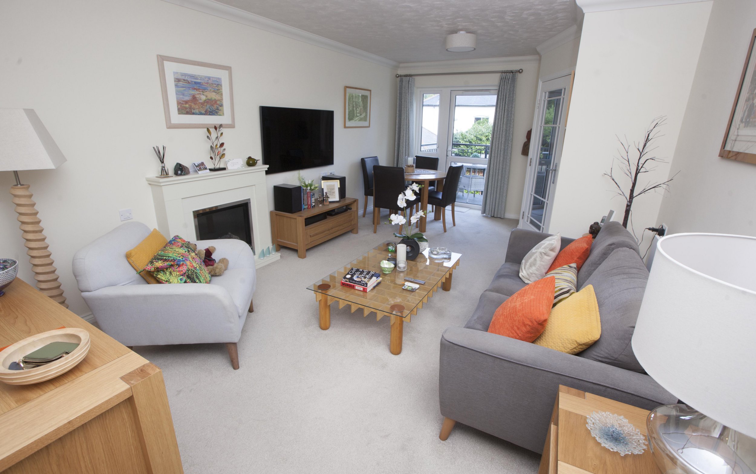 Gill Ross and her apartment in Bagshot, Surrey are the subject of a What I Own feature. This picture shows the living room.