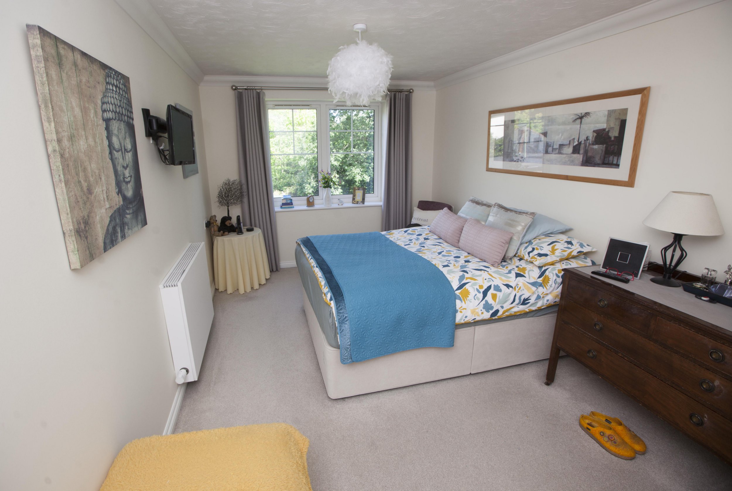 Gill Ross and her apartment in Bagshot, Surrey are the subject of a What I Own feature. This picture shows the bedroom.