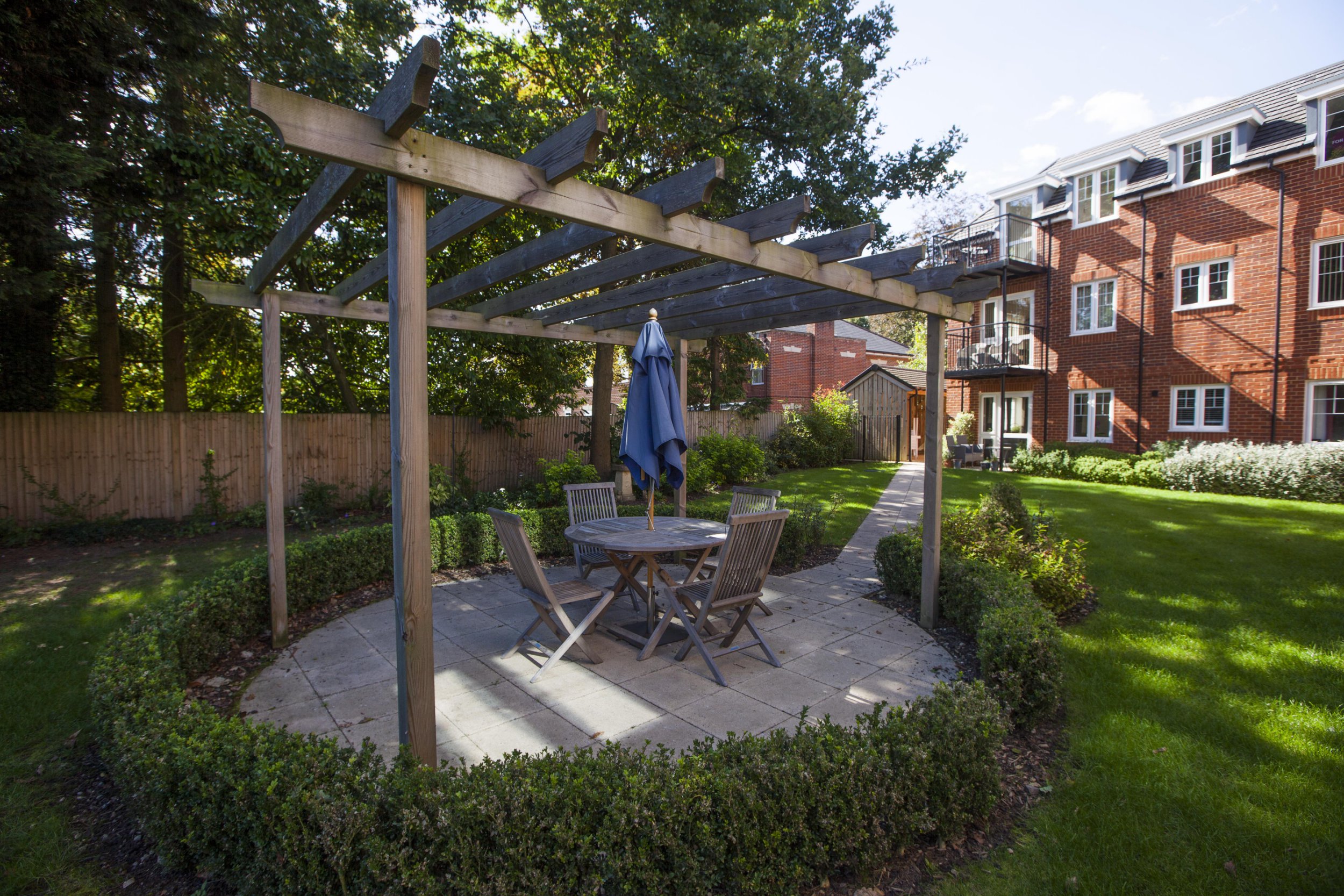 Gill Ross and her apartment in Bagshot, Surrey are the subject of a What I Own feature. This picture shows the private gardens.