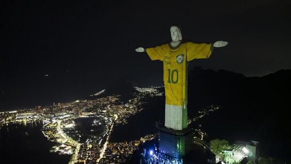 Christ the Redeemer statue illuminated with Brazil shirt as tribute to Pele
