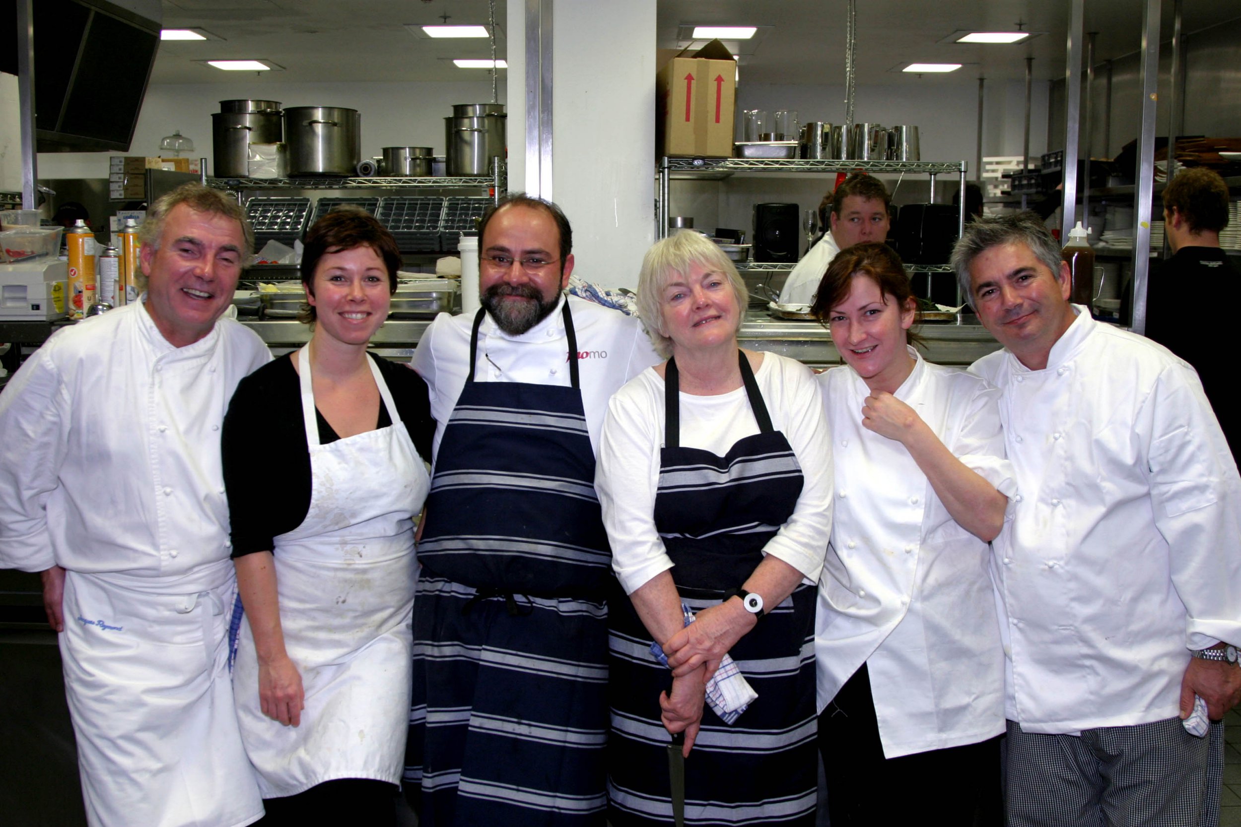 Greg Malouf stood with a group of people