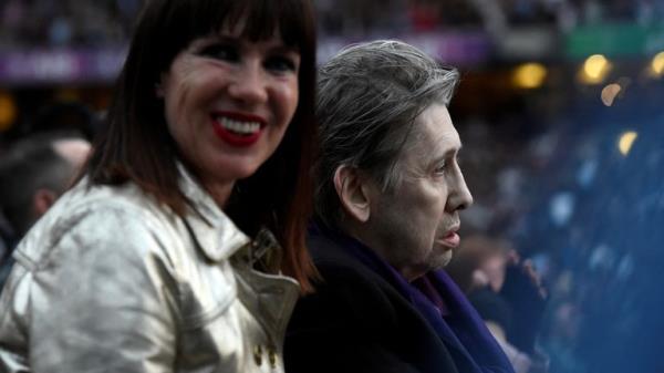 FILE PHOTO: Musician Shane MacGowan watches as U2 perform during their U2: The Joshua Tree Tour, at Croke Park, Dublin, Ireland July 22, 2017. REUTERS/Clodagh Kilcoyne/File Photo