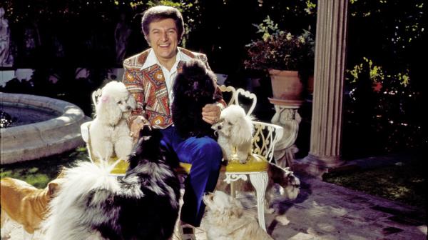 Liberace with his dogs