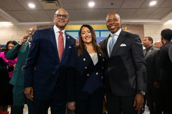 Chancellor David Banks, left, newly appointed chancellor Melissa Aviles-Ramos, center, and Mayor Eric Adams, right, at a press conference announcing Banks' retirement at the Bronx School of Law, Government and Justice at 244 East 163rd St., Bronx, New York on Wednesday, Sept. 25, 2024. (Shawn Inglima for New York Daily News)
