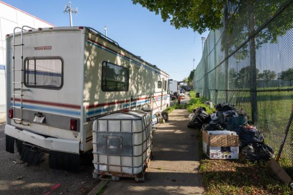 RVs and a generator, trash