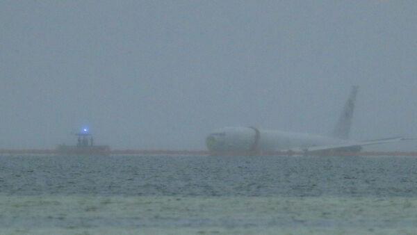 Flight data recorder recovered from US navy plane that overshot runway