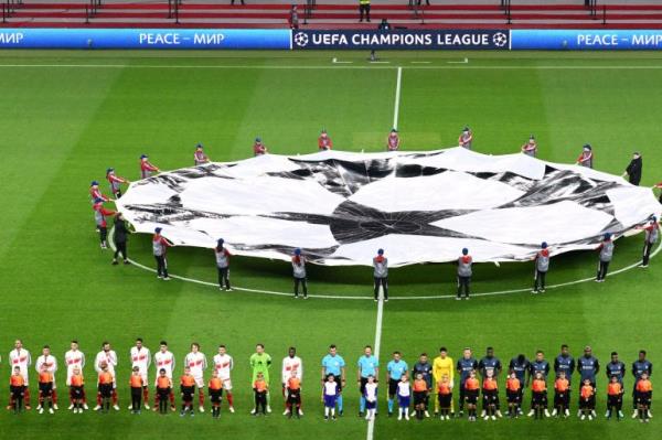 Soccer Football - Champions League - Group C - 1. FC Union Berlin v S.C. Braga - Olympiastadion, Berlin, Germany - October 3, 2023 The players line up before the match as fans display an anti UEFA banner REUTERS/Annegret Hilse