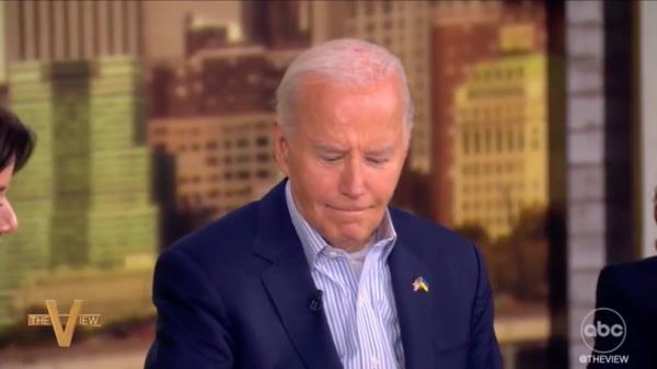 Biden slammed his hands on the table in an imitation of squashing Trump.
