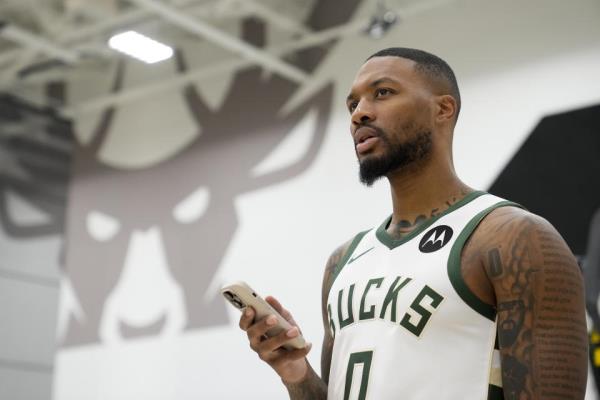 Damian Lillard appears pleased to have not landed in Toronto. (Patrick McDermott/Getty Images)