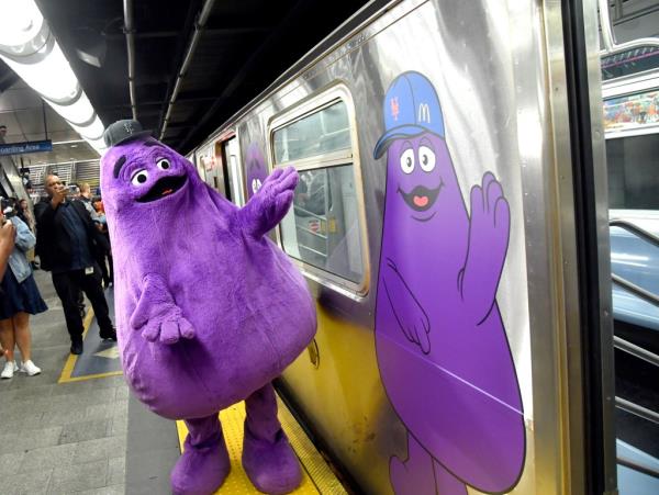 Grimace rides the 7 train from 34 St-Hudson Yards towards Mets-Willets Pt on Tuesday, Oct 8, 2024.