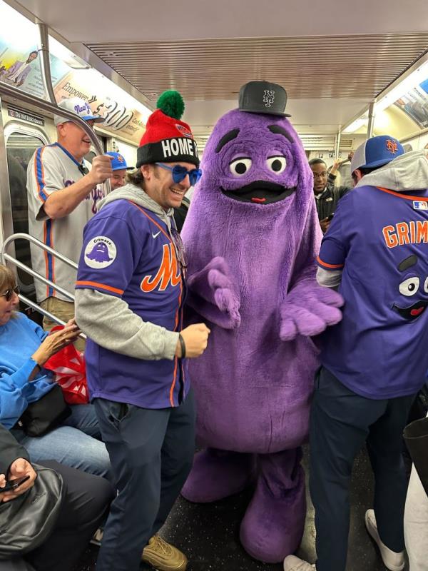Grimace rides the 7 train from 34 St-Hudson Yards towards Mets-Willets Pt on Tuesday, Oct 8, 2024.