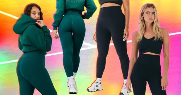 Women modelling In The Style fits leggings in green and black 