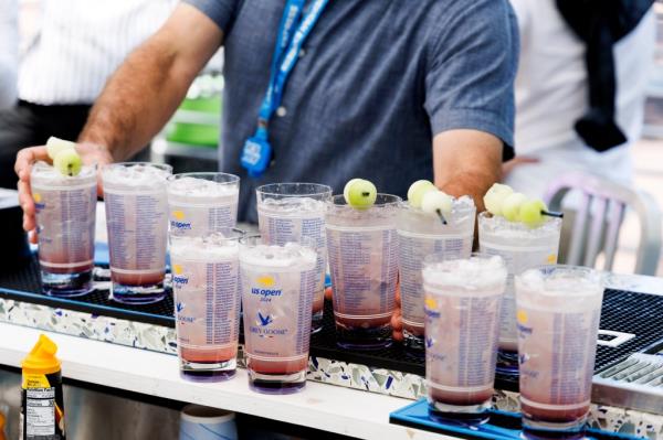 Bartender pouring Honey Deuce cocktails at the 2024 US Open Championships in Queens, New York