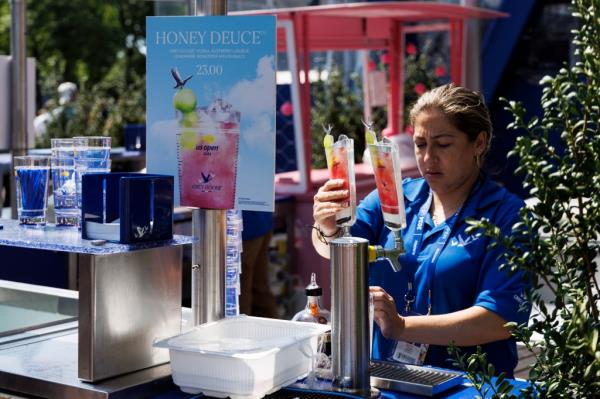 Bartender pouring Honey Deuce cocktails at the 2024 US Open Championships in Flushing, New York