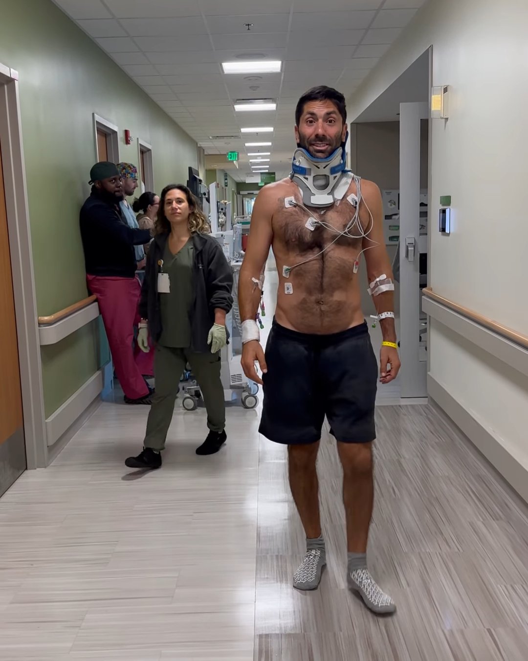 Catfish star Nev Schulman walking in hospital in neck brace