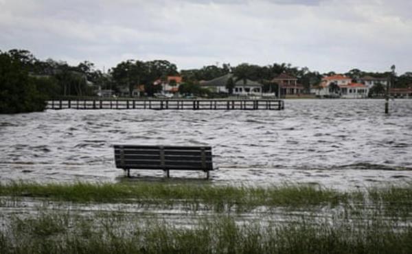 Flooded streets are seen along Coffee Pot Bayou as Hurricane Helene charges toward the Big Bend region of Florida.