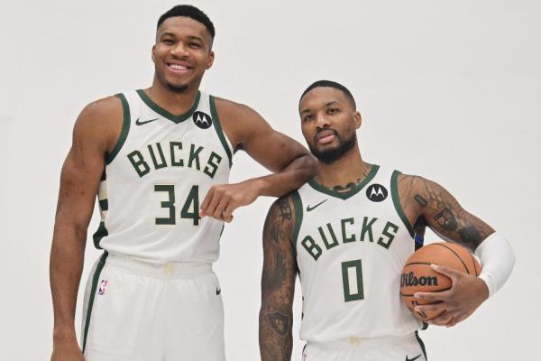 Milwaukee Bucks forward Giannis Antetokounmpo and guard Damian Lillard pose for a photo during media day in Milwaukee on Oct. 2, 2023. (Benny Sieu/USA TODAY Sports)