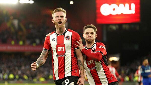 Oli McBurnie keeps cool from the spot to snatch Sheffield United a point against West Ham