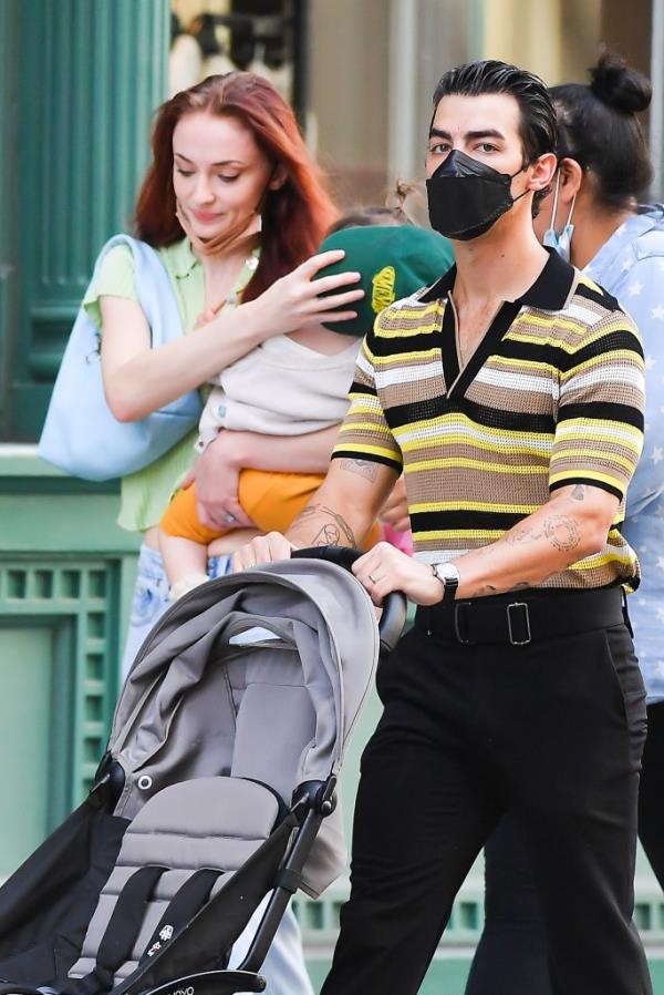 Sophie Turner/Joe Jonas and a child.