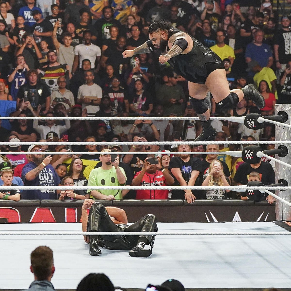 Bronson Reed attacks Seth Rollins during WWE Monday Night Raw with a huge Tsunami from the top rope