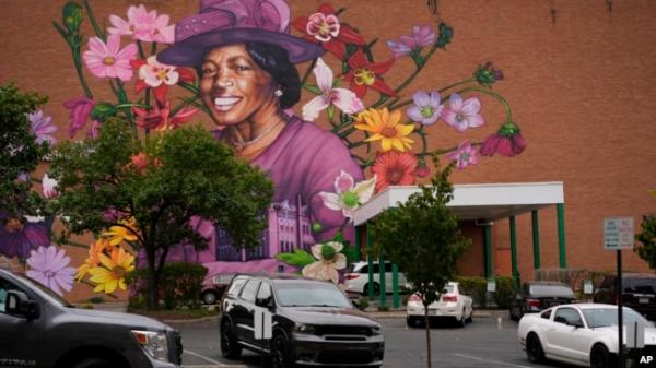 A mural depicting Hattie Moseley, a Springfield Civil Rights activist, is painted on the WesBanco building on East Main Street in Springfield, Ohio, Sept. 17, 2024, in Springfield, Ohio.