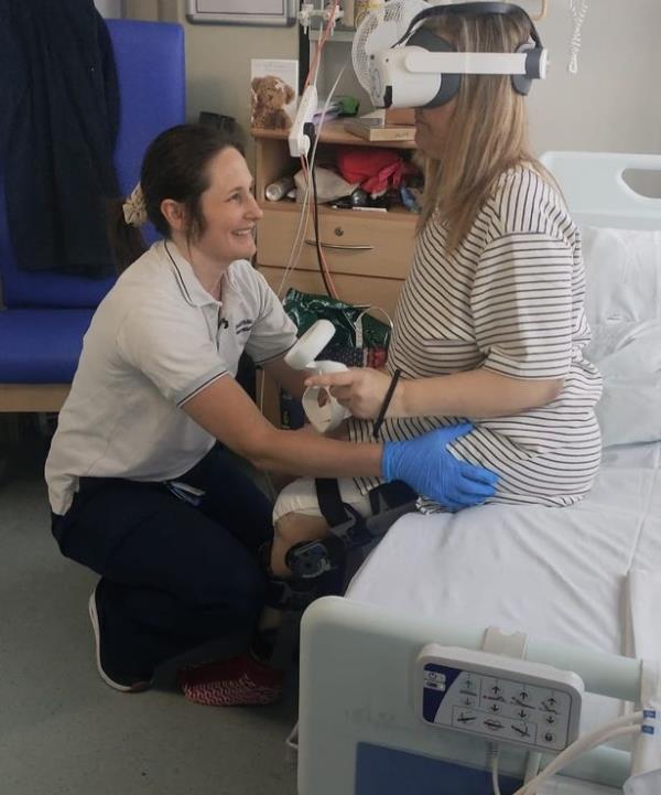 Becky during a therapy session with physiotherapist Beth