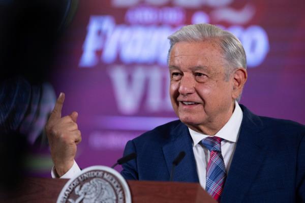 Mexican President Andres Manuel Lopez Obrador gestures during a press conference, where he rejected U.S. plans to build new sections of wall at the U.S.-Mexico border.