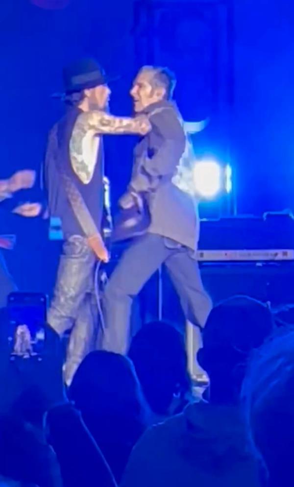 Perry Farrell and Dave Navarro fight on stage in Boston