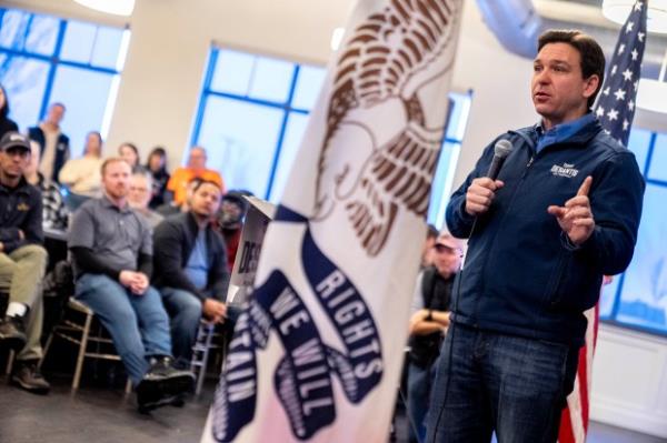 Republican presidential candidate Florida Gov. Ron DeSantis speaks at a Northside Conservatives Club Meeting at The District in Ankeny, Iowa, Friday, Jan. 12, 2024. (AP Photo/Andrew Harnik)