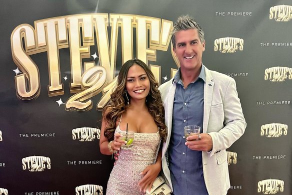 Essendon premiership player Ricky Olarenshaw and his wife, Sarnanitha, in 2023.