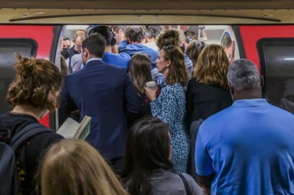 People pack into a carriage on the Northern line during rush hour 
