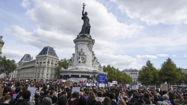 People gather at Place de la Republique in Paris to support Gisele Pelicot.