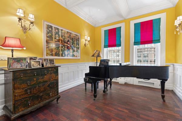 The townhouse comes with plenty of space, including room for a grand piano