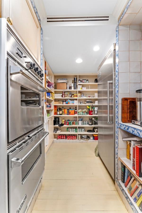 The chef's kitchen comes with a pantry and room for cook books too