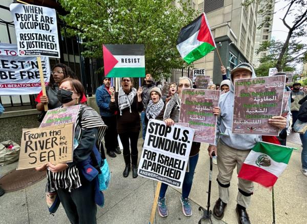 Palestinian-Americans and their supporters protest as the conflict between Israel and the Palestinian militant group Hamas continues, outside the Israeli consulate in downtown Chicago, U.S., October 8, 2023.